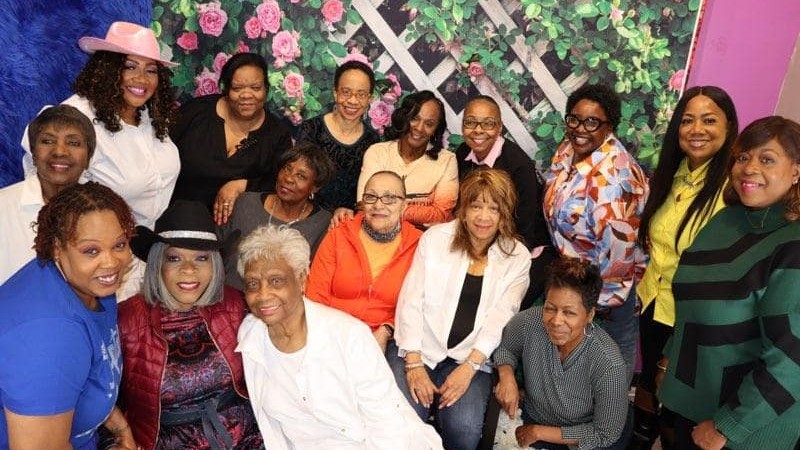 Large group of women pose for the camera at 2025 RWHC event